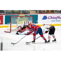 Spokane Chiefs center Bear Hughes skates in on the Prince George Cougars