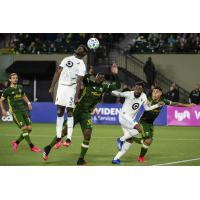 Minnesota United FC defender Ike Opara goes high for a ball