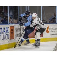 Andreas Borgman of the San Antonio Rampage (right) throws a hit on Milwaukee Admirals defenseman Ben Harpur