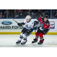 Kelowna Rockets left wing Mark Liwiski (right) vs. the Victoria Royals