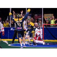 Shayne Jackson (center) and Lyle Thompson celebrate a Georgia Swarm goal