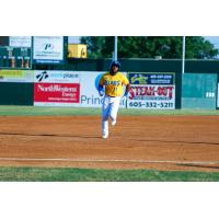 Jabari Henry of the Sioux Falls Canaries rounds the bases following his home run