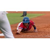 Hueston Morrill of the Tulsa Drillers slides safely back into first base during Wednesday's action at ONEOK Field