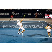 Washington Kastles Marcelo Arevalo (center) and Arina Rodionova put the finishing touch on the San Diego Aviators