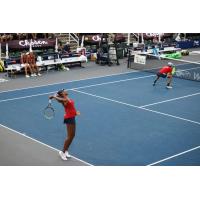 Venus Williams serving in mixed doubles action for the Washington Kastles