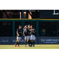 Tacoma Defiance celebrates a 3-0 win over Timbers 2 on July 18 at Cheney Stadium