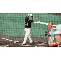 Milwaukee Milkmen catcher Christian Correa crosses the plate following his third inning homer