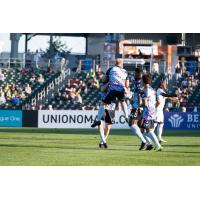 Forward Madison FC celebrate Eric Leonard's goal vs. Union Omaha