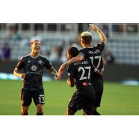 Louisville City FC celebrates a goal against Sporting Kansas City II