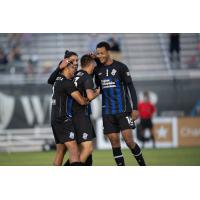 Colorado Springs Switchbacks FC celebrate an Aidan Daniels goal against New Mexico United