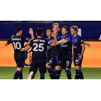 The San Jose Earthquakes celebrate the match's opening goal