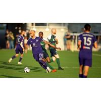 Louisville City FC forward Cameron Lancaster with possession vs. Saint Louis FC