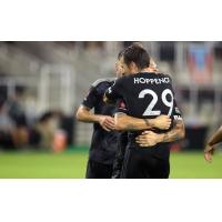 Louisville City FC celebrates a goal against Saint Louis FC