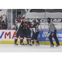 Prince George Cougars react after a goal vs. the Vancouver Giants