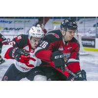Vancouver Giants right wing Dallon Wilton (right) vs. the Prince George Cougars