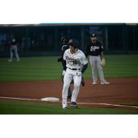 Jarred Kelenic of the Tacoma Rainiers rounds third after a home run