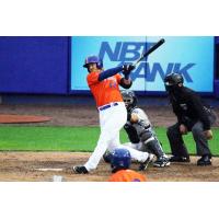 Martin Cervenka of the Syracuse Mets follows through during his home-run swing in the bottom of the second inning