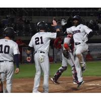 Estevan Florial of the Somerset Patriots jogs past home plate following his homer