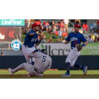 Tulsa Drillers shortstop Jacob Amaya and Michael Busch turn a double play in the Tuesday win at ONEOK Field