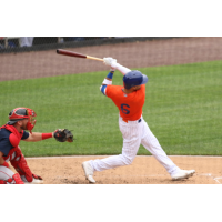 Albert Almora, Jr. finishes his swing on a ball he hit for a two-run home run for the Syracuse Mets on Wednesday afternoon