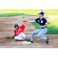St. Cloud Rox try to beat the throw at third against the Duluth Huskies
