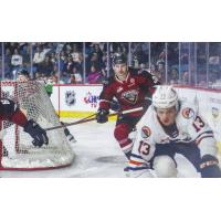 Vancouver Giants right wing Justin Lies (left) vs. the Kamloops Blazers