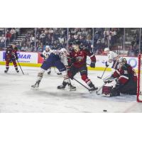 Vancouver Giants defenceman Cadieux (center) vs. the Kamloops Blazers