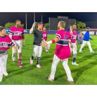 Victor Victor Mesa and the Pensacola Blue Wahoos celebrate a walk-off win