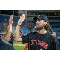 Ottawa Titans exchange high fives after a win against the Florence Y'alls