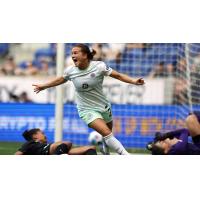 Racing Louisville FC midfielder Lauren Milliet reacts after her goal against NJ/NY Gotham FC