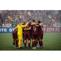 Detroit City FC huddles