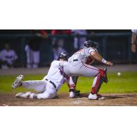 Tri-City ValleyCats infielder Brantley Bell slides home against the New Jersey Jackals