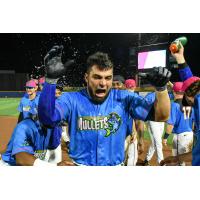 Pensacola Blue Wahoos and Norel González react after a walk-off win