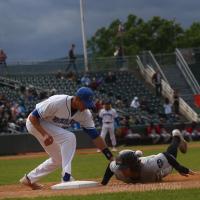 New York Boulders' Giovanni Garbella applies the tag vs. the Tri-City ValleyCats