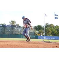 Captain America helps prepare the field at a Charleston RiverDogs game