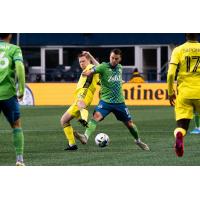 Seattle Sounders FC midfielder Albert Rusnák battles Nashville SC