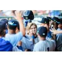 River Town receives high fives in the Columbia Fireflies dugout