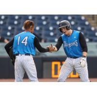 Tampa Tarpons' Ben Rice and Madison Santos