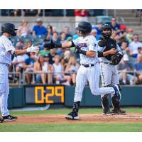 Austin Wells of the Somerset Patriots rounds the bases