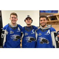 Saint John Sea Dogs' Connor Trenholm, Charlie DesRoches, and Marshall Lessard wearing their jerseys with letters
