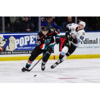 Kelowna Rockets' Jackson DeSouza versus Portland Winterhawks' Nicholas Johnson