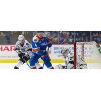 San Diego Gulls' Drew Helleson takes on Ontario Reign's goaltender Pheonix Copley