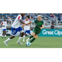 Charlotte Independence's Rayan Djedje versus Lexington Sporting Club's Charlie Machell