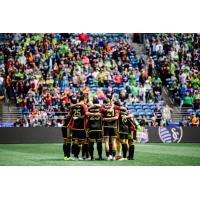 Sounders FC huddle