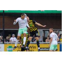 Detroit City FC forward Yazeed Matthews (left) vs. the Pittsburgh Riverhounds