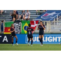 Malia Berkely (right) and Narumi of the North Carolina Courage