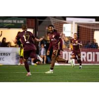 Detroit City FC defenders Matt Lewis (left) and Devon Amoo-Mensah