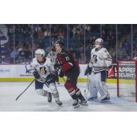 Vancouver Giants' Tyler Thorpe and Kamloops Blazers' Ryan Michael and Matthew Kieper on game night