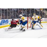 Red Deer Rebels' Frantisek Formanek and Saskatoon Blades' Jordan Martin in action