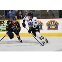 Kamloops Blazers' Emmitt Finnie and Wenatchee Wild's Conor Geekie in action